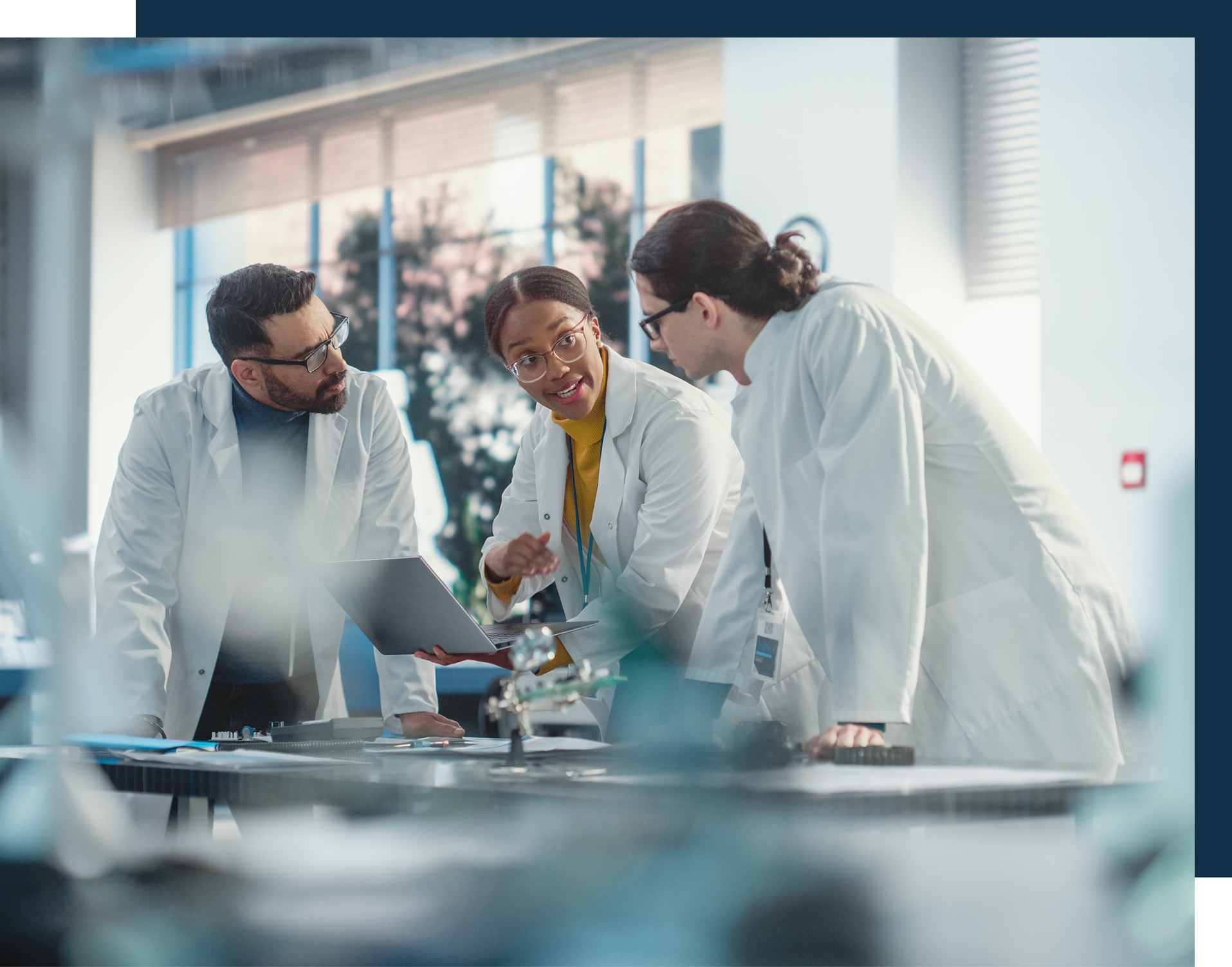 Medical professionals collaborating on research in a lab